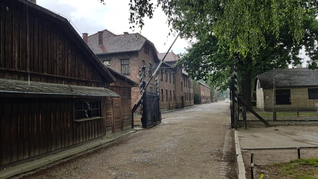 Open gate to the Auschwitz-Birkenau complex, which is the destination Auschwitz tours. "Arbeit Macht Frei".